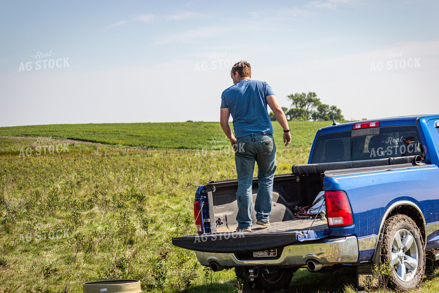 Farmer Unloading Truck Bed 155095