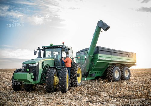 Farmer Climbing into Tractor 185067
