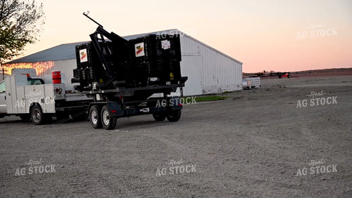 Loading the Seed Tender with a Skidsteer - 096
