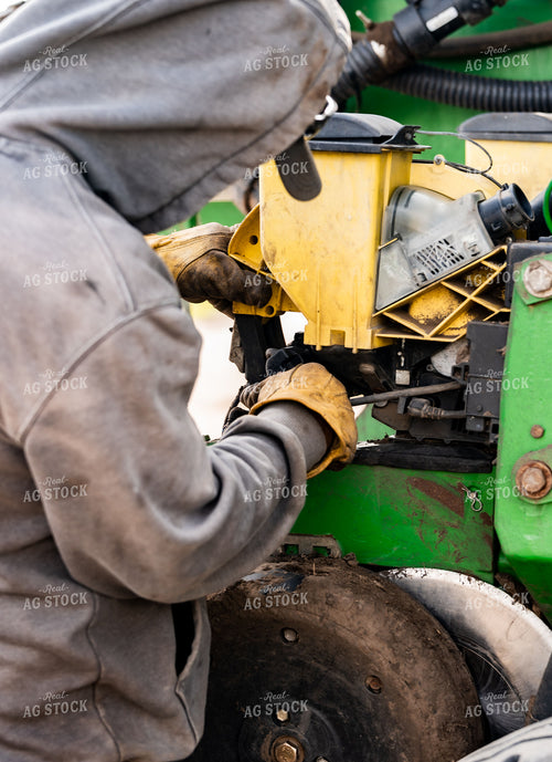Farmer Working on Planter 185223
