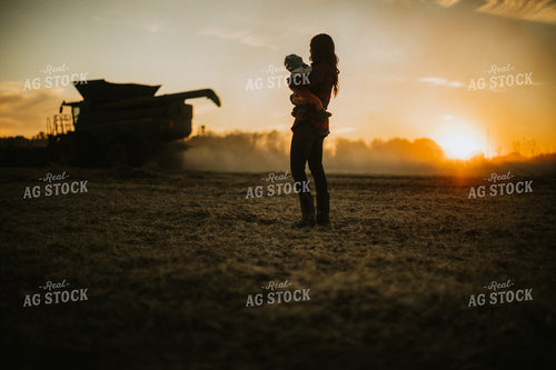 Farm Mom and Wife with Baby in Soybean Field with Combine 5111