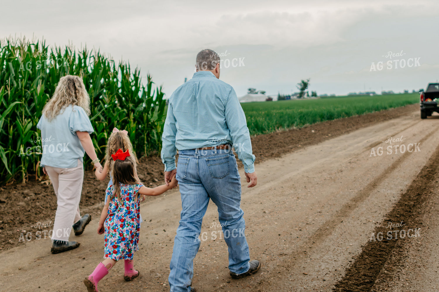 Farmers and Farm Kids Walking on Gravel Road 218067