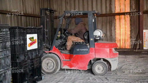 Loading the Seed Tender with a Skidsteer - 063