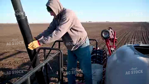 Loading the Planter with the Seed Tender - 081