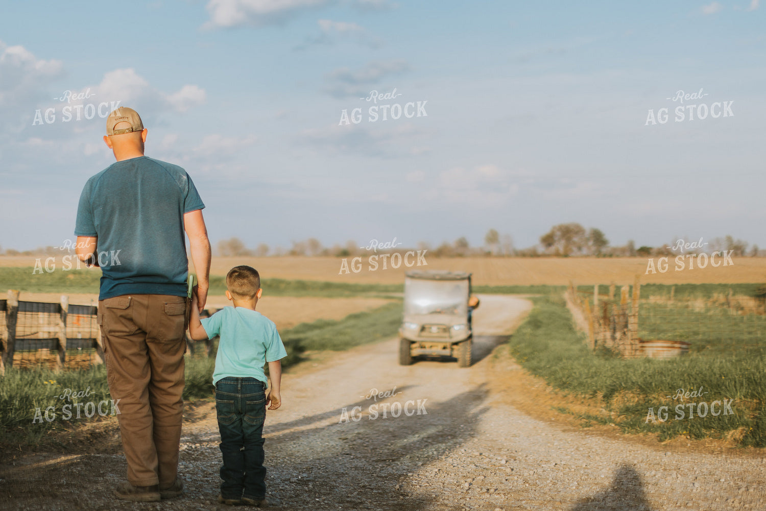 Farmer and Farm Kid Walking Down Road 7410