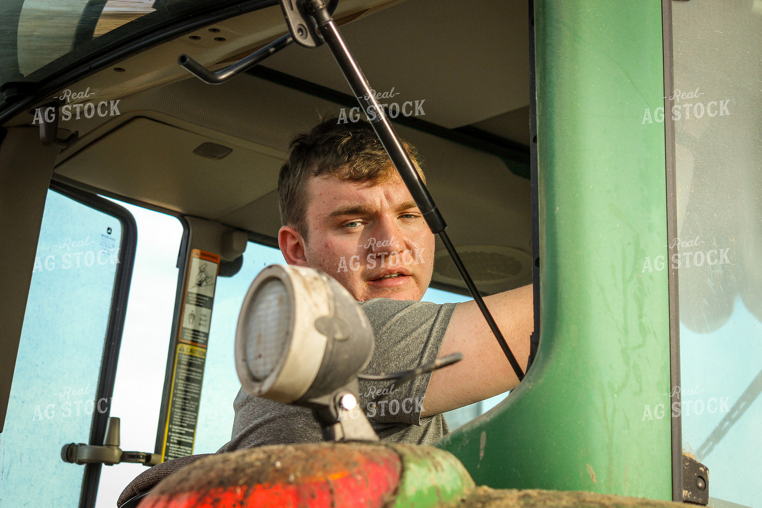 Farmer Driving Tractor 155094