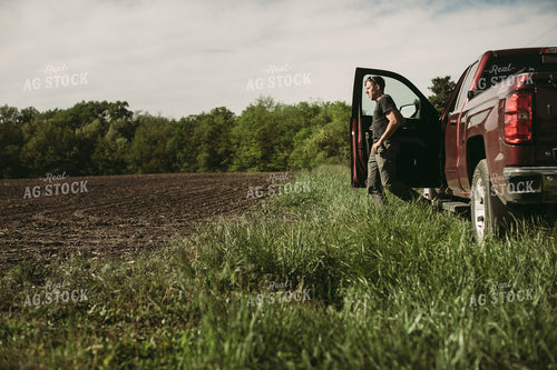 Farmer Getting Out of Pickup Truck 4156