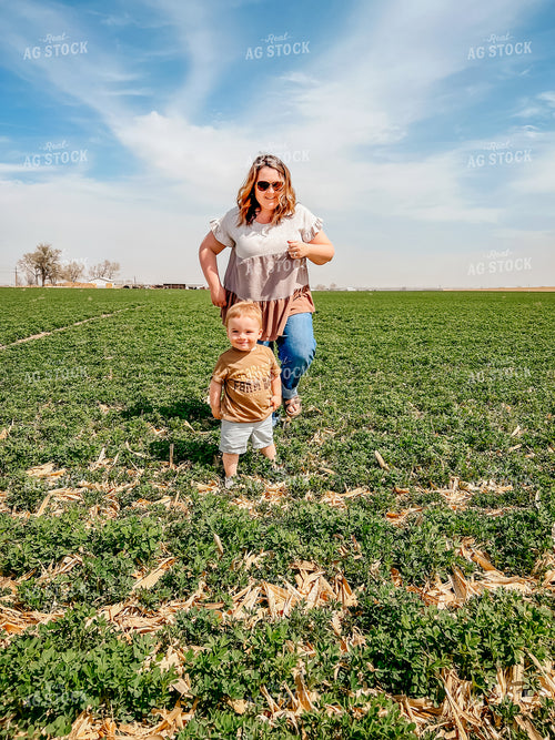 Farm Mom and Farm Kid in Field 56290