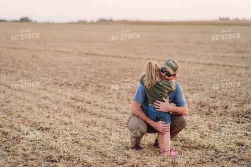Farmer Giving Farm Kid Hug 115020