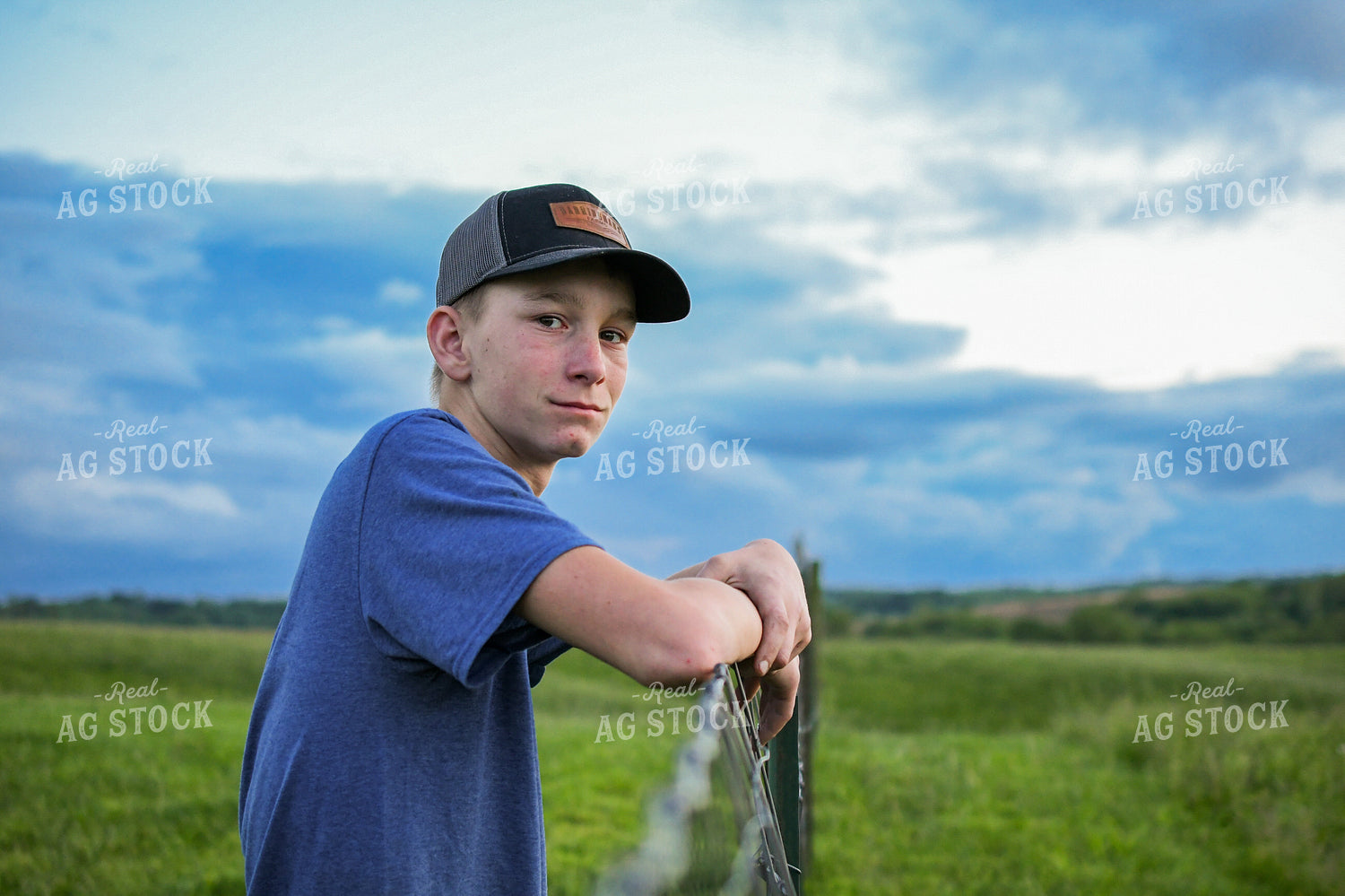 Farm Kid Leaning on Fence 191160