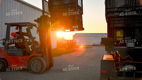 Loading the Seed Tender with the Skidsteer 25325