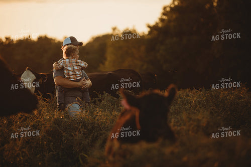 Farm Family with Cows in Pasture 3189