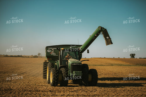 Female Farmer in Tractor with Grain Cart 4768
