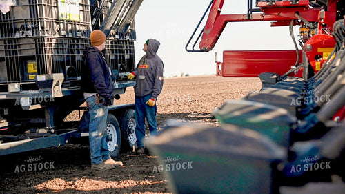Farmers Chatting by the Planter 25206