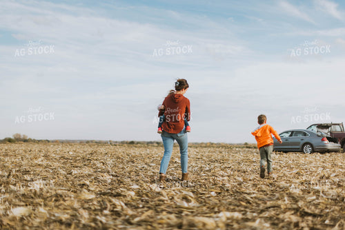 Female Farmer and Kids Playing in Cornfield 8524