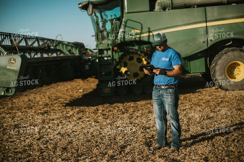 Farmer in Field With Tablet 7150