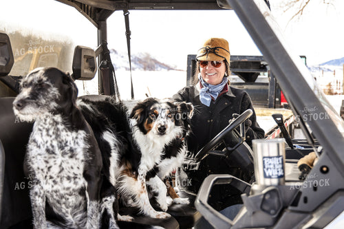 Female Rancher with Dogs 163045
