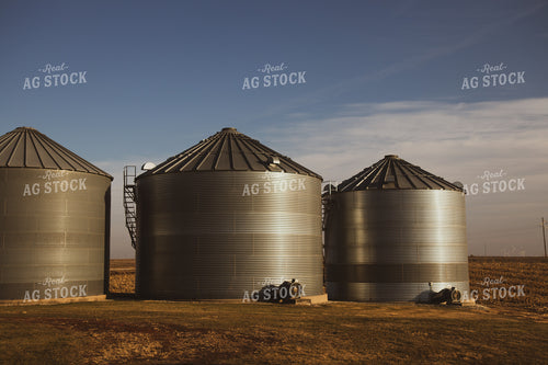 Grain Bins and Harvested Corn Field 67235