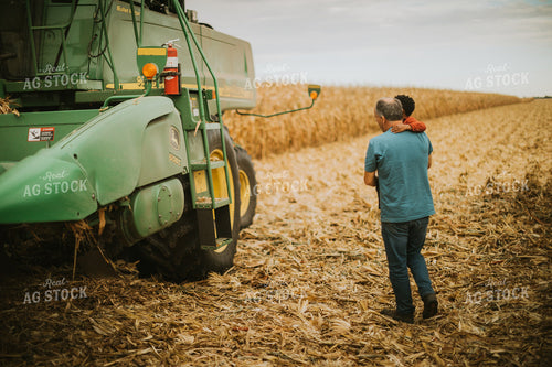 Farmer and Farm Kid in Field 6660