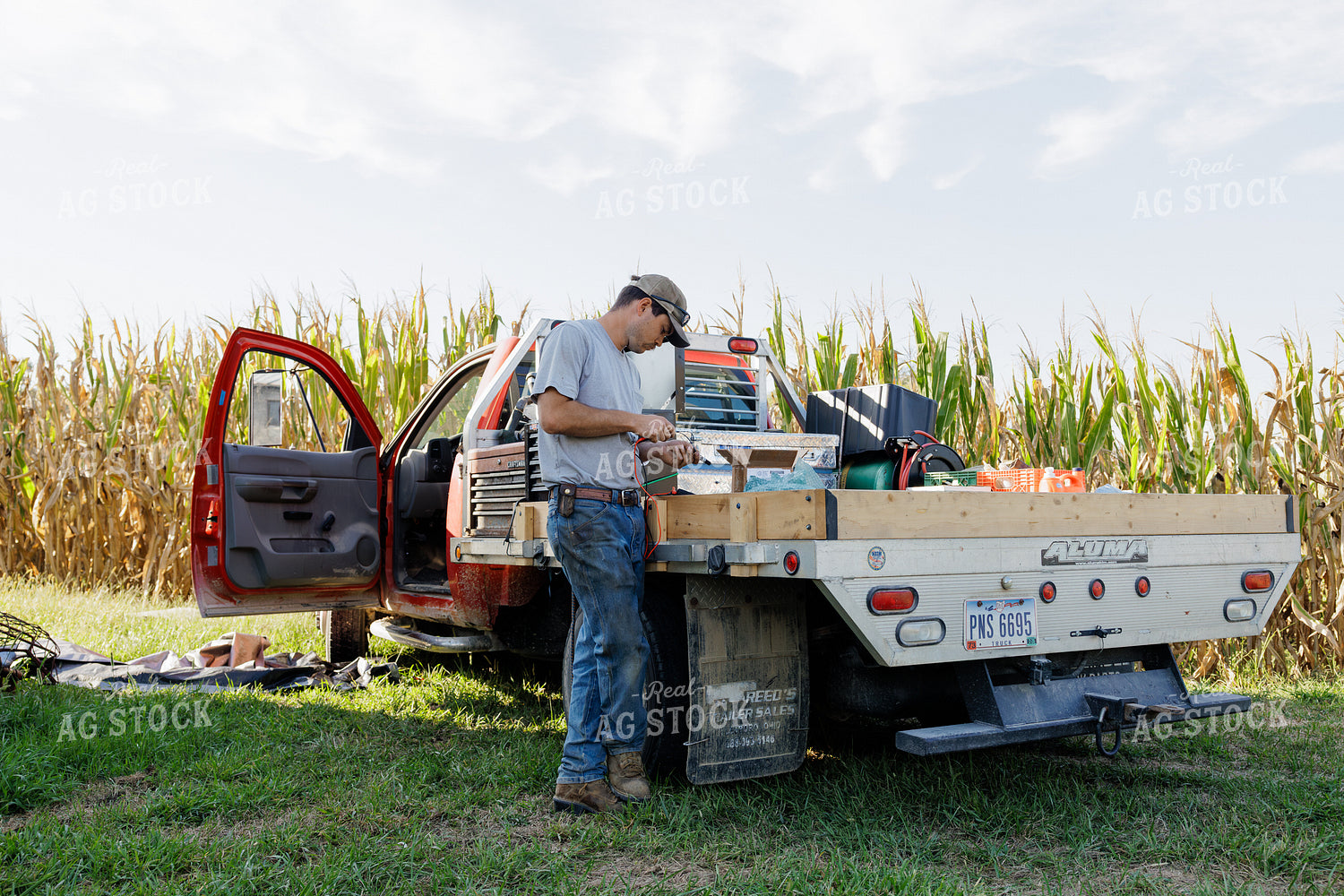 Farmer Making Repairs 295029