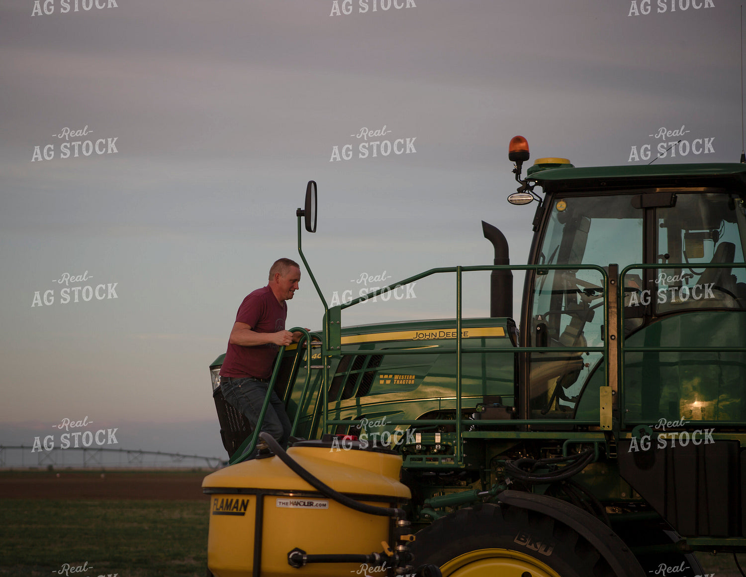 Farmer Climbing into Self-Propelled Sprayer 135099