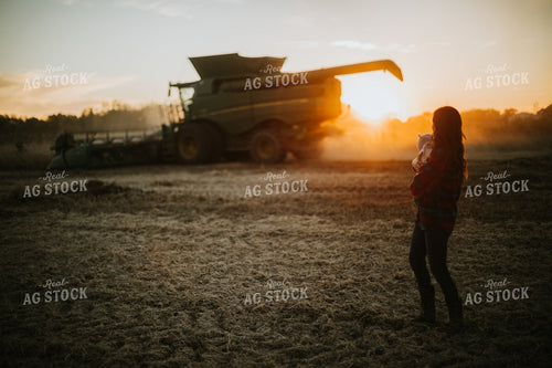 Farm Mom and Wife with Baby in Soybean Field with Combine 5108