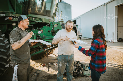 Farmers Eating Field Meals While Working on Combine 5061