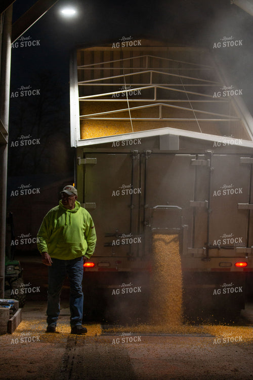 Farmer Unloading Semi 157159