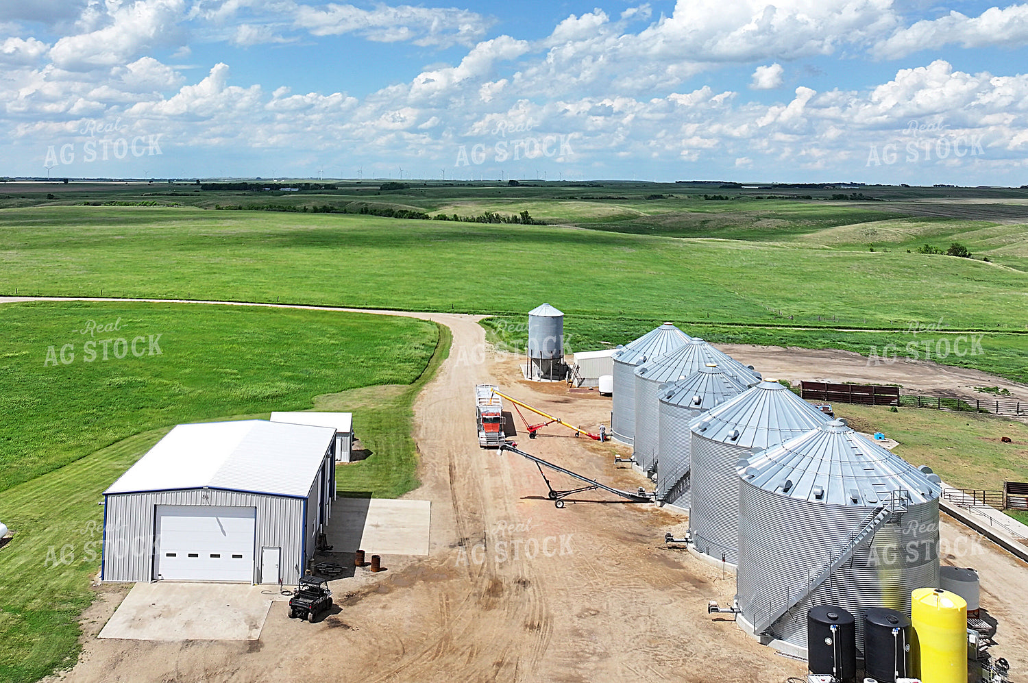 Unloading Bins and Hauling Grain 141568