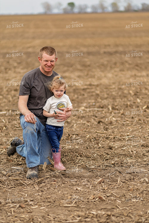 Farmer and Daughter Checking Soybeans 93310