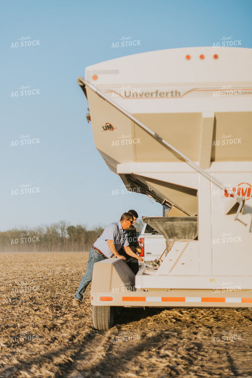 Farmers Prepare Seed Tender in Field 7693