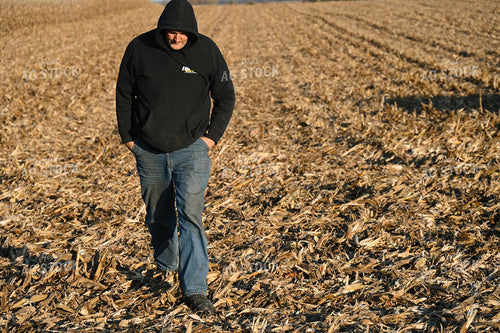 Farmer Walking in Field 26286