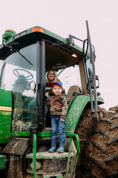 Farm Family in Tractor Cab 169068