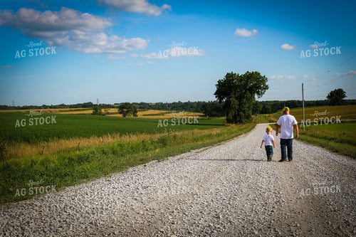 Farm Kids Walking on Gravel Road 214078