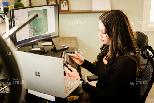 Female Appraiser Working at Computer 9419