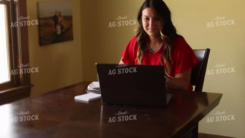 Female Farmer Working on Computer 8700