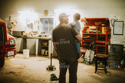 Farmer with Farm Kid in Shop 5137