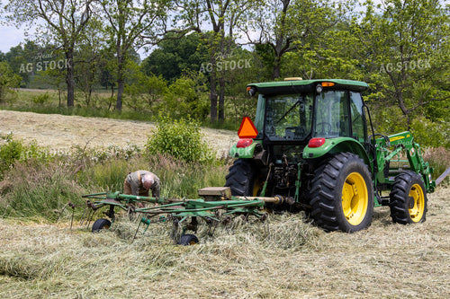 Farmer in Hay Field 52164