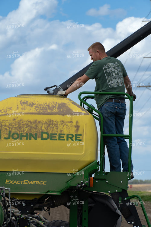 Farmer Filling Planter 65413
