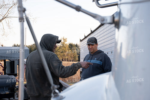Farmers Talking by Truck 50459