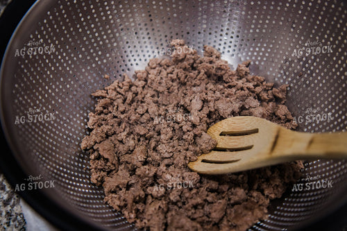 Cooked Ground Beef Draining in Collander 67324