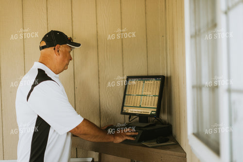 Farmer Checking Markets 7748