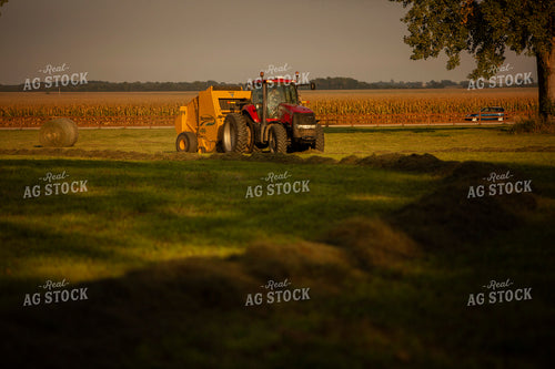 Tractor Baling Hay 5501
