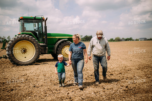 Farm Family Walking by Tractor 169083