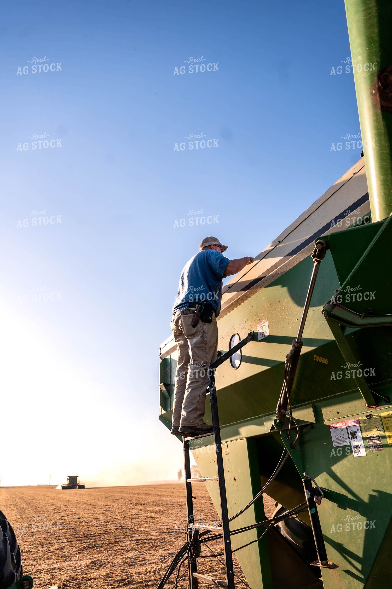 Farmer Checking Wagon 115849