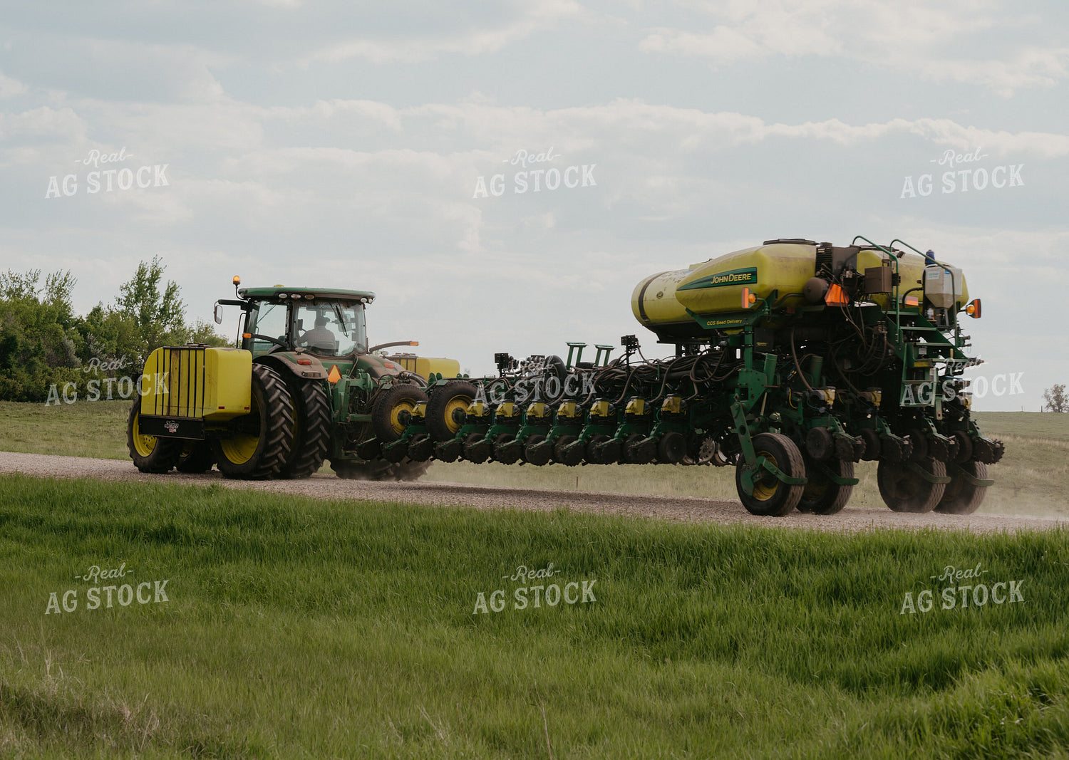 Tractor and Planter on Road 185130