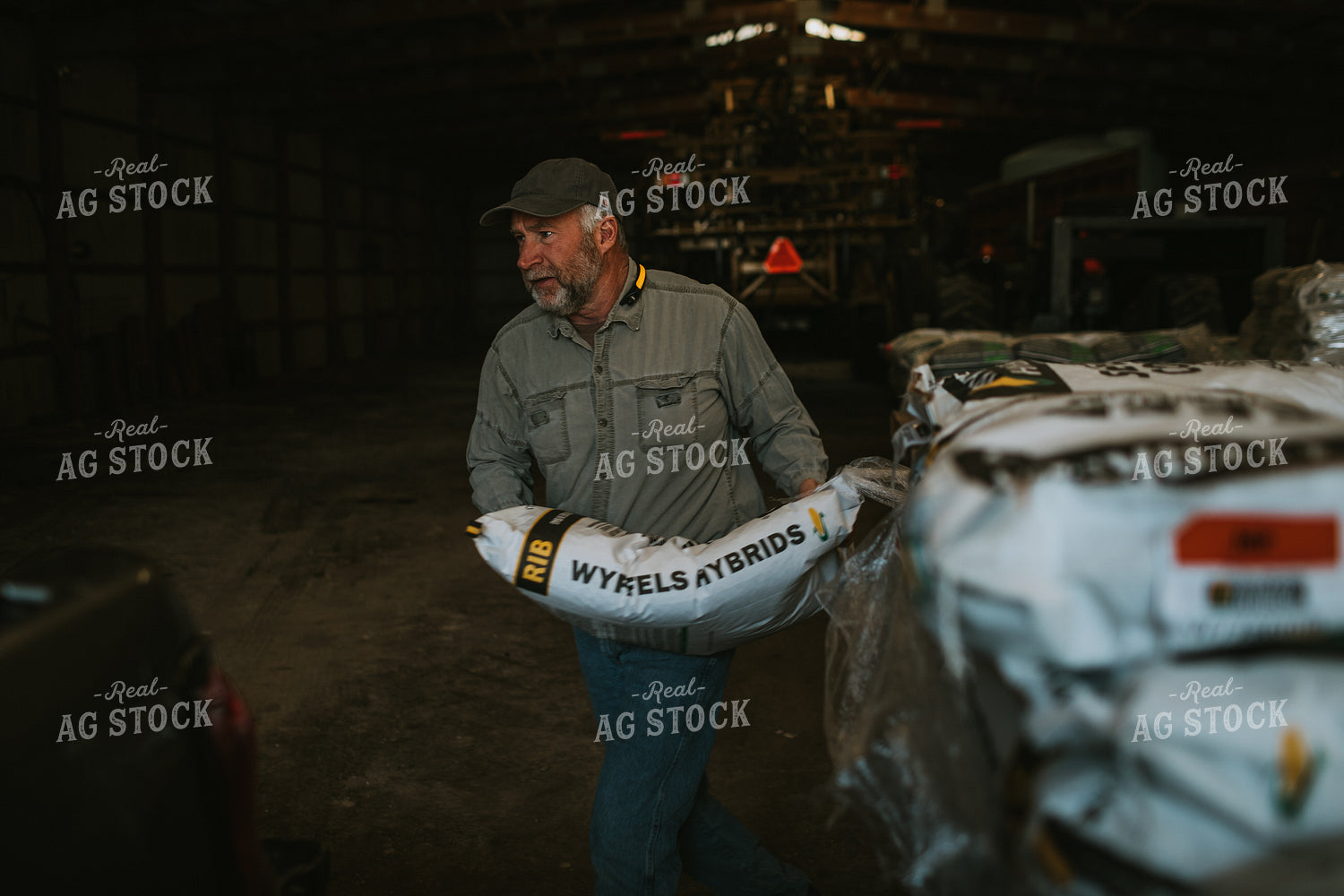 Farmer Loading Seed Bags 4076