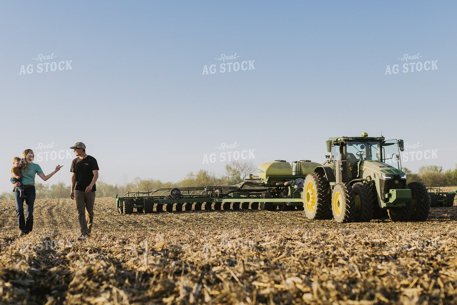 Young Couple with Child Walk Away from Tractor 7676