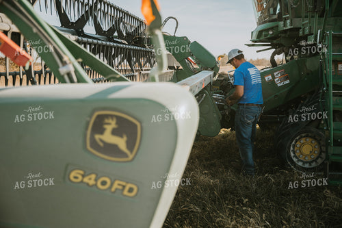 Farmer Attaching Combine Head 7089