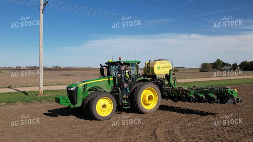 Farm Family Climbing Out of Tractor 65859